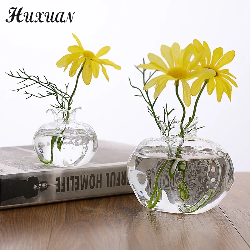 vase decoratif grenade forme texturée transparent moderne fleurs feuilles eau bleue minimaliste