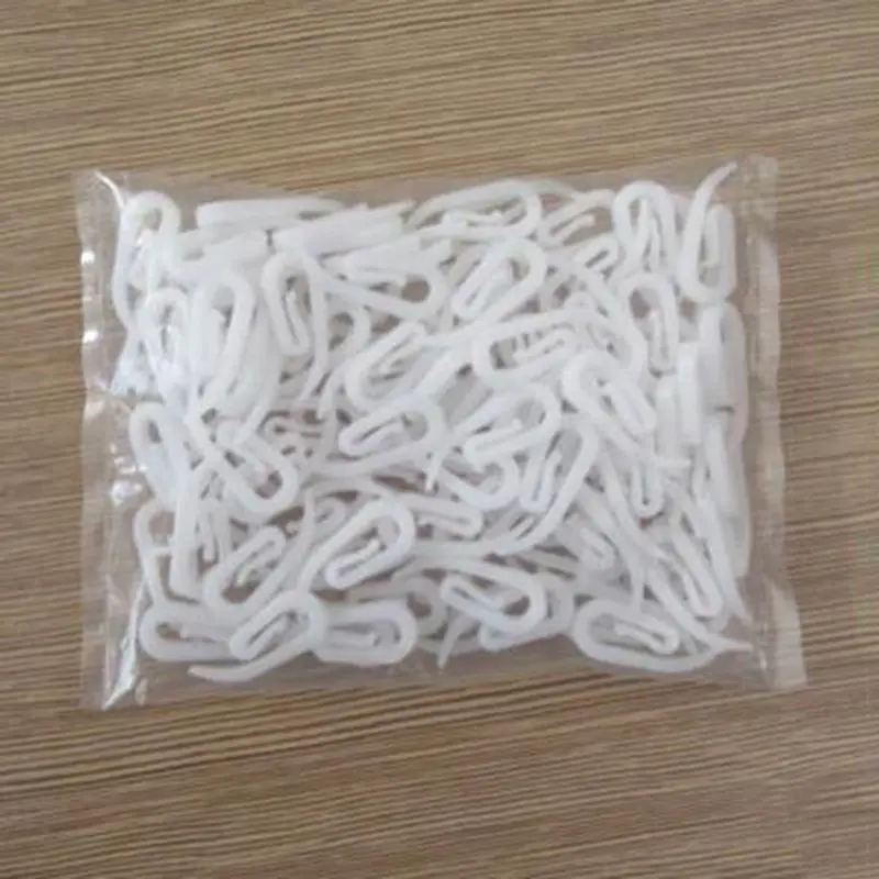 Crochets en Plastique pour Rideaux (100cps)