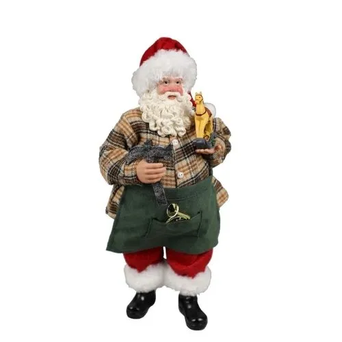 Père Noël charpentier debout