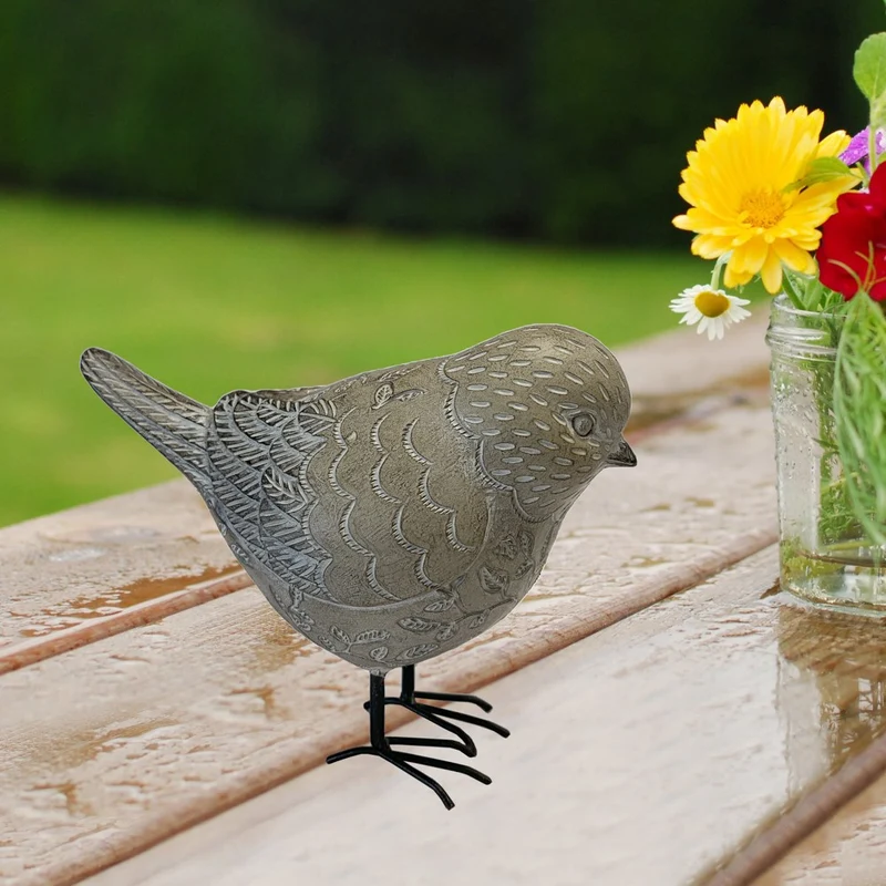 Petite statue d’oiseau gris décorative