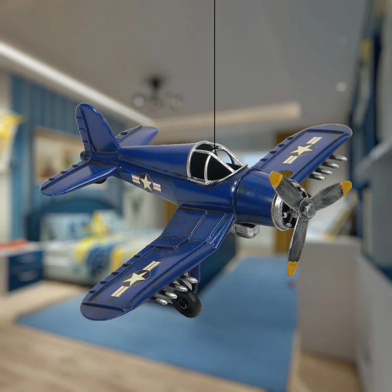 Avion rétro en métal bleu à hélice